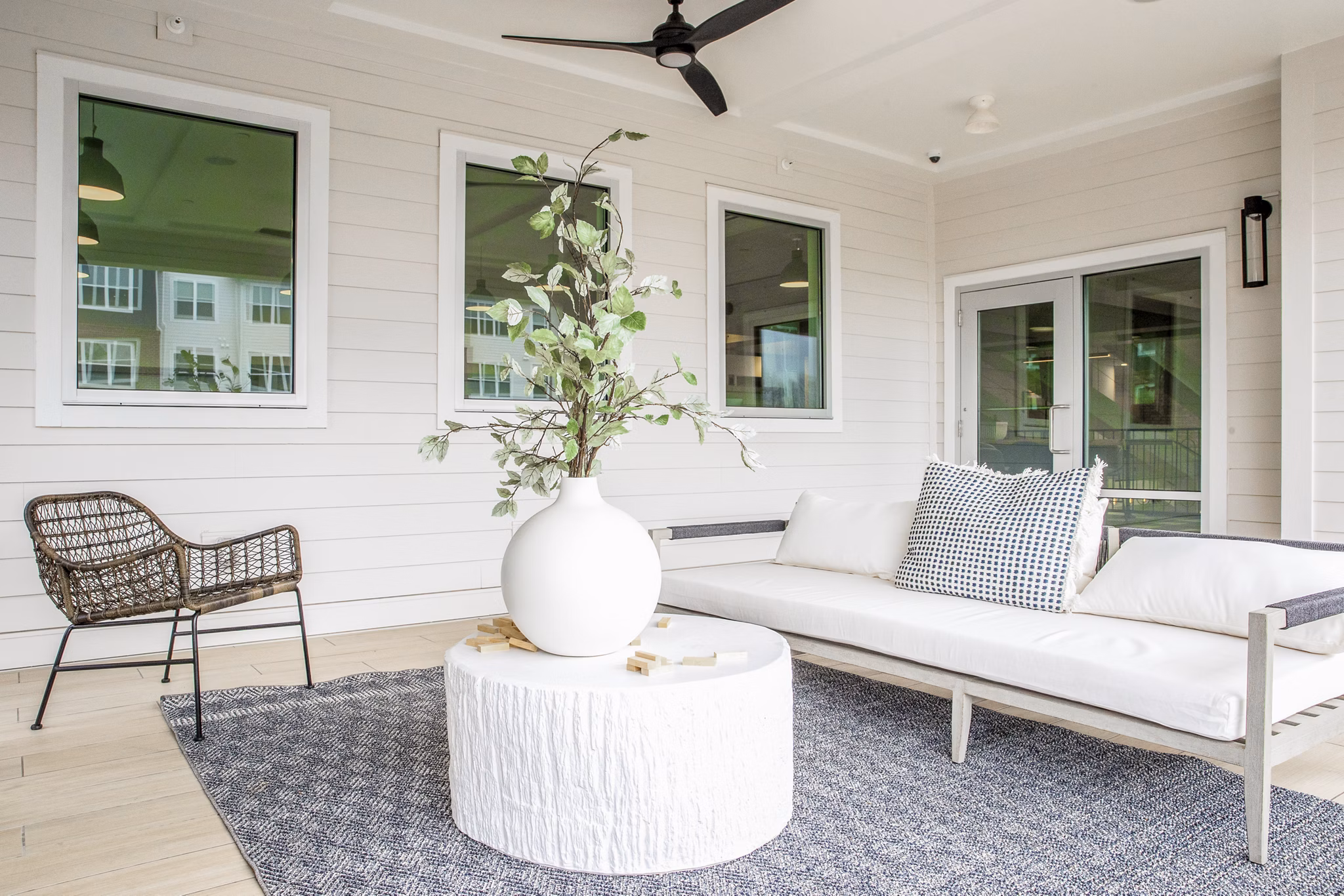 Modern clubhouse with stylish seating and pool table at Alta Wren Apartments, enhancing luxury living experiences