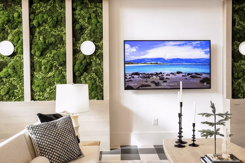Clubhouse at Alta Wren Apartments: Luxurious space with modern decor and cozy seating for residents to relax and socialize