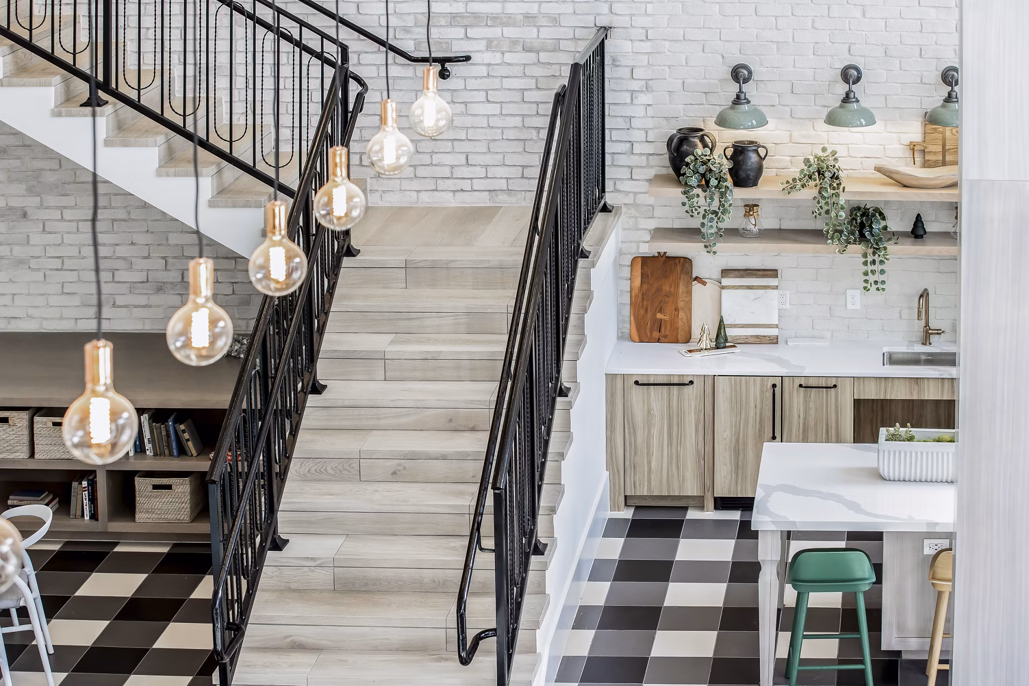 Modern clubhouse with stylish interiors at Alta Wren Apartments featuring cozy seating and large screen TV