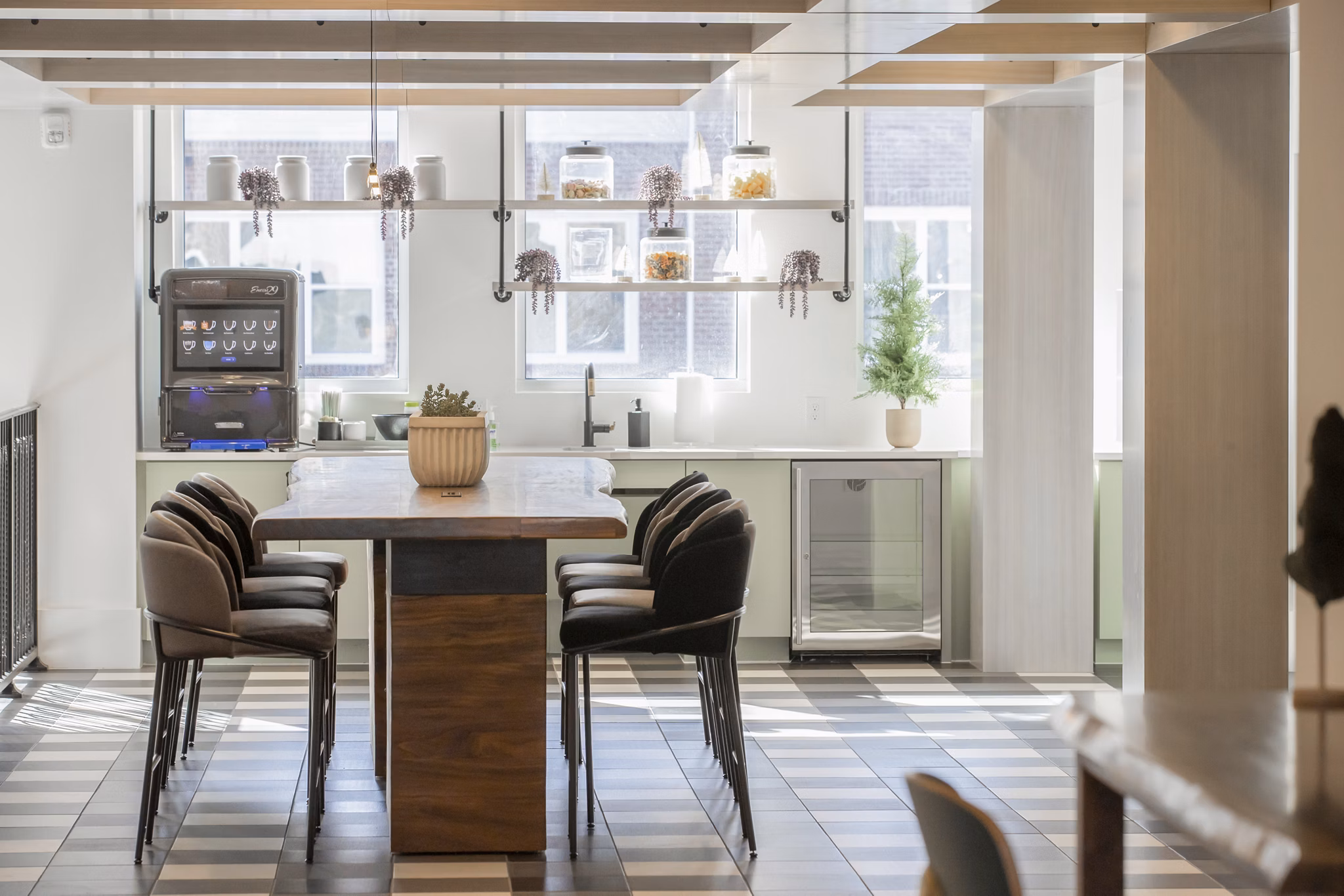 Clubhouse featuring modern design and comfortable seating at Alta Wren Apartments, ideal for social gatherings and community events