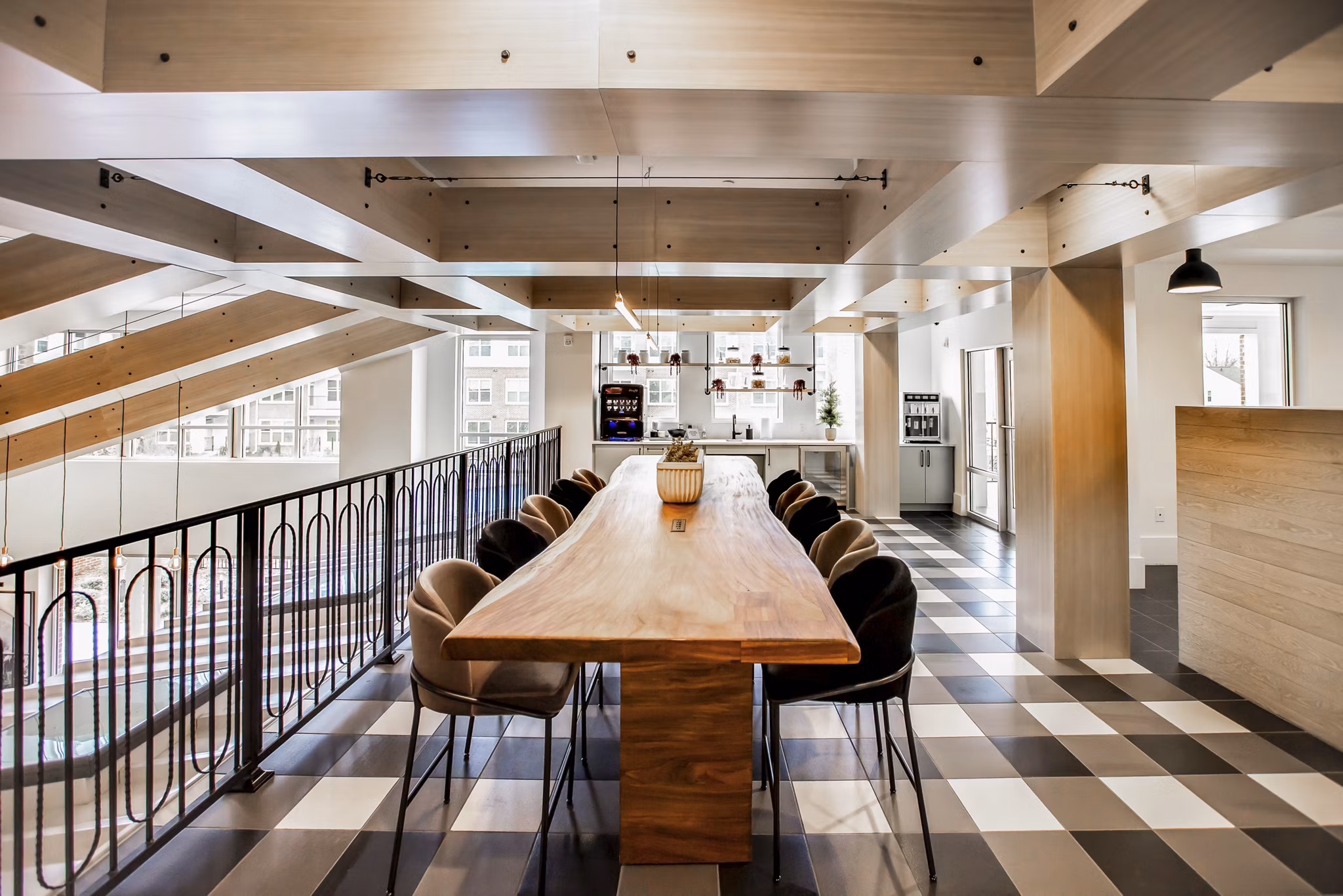 Elegant clubhouse with modern decor at Alta Wren Apartments, ideal for social gatherings and relaxation