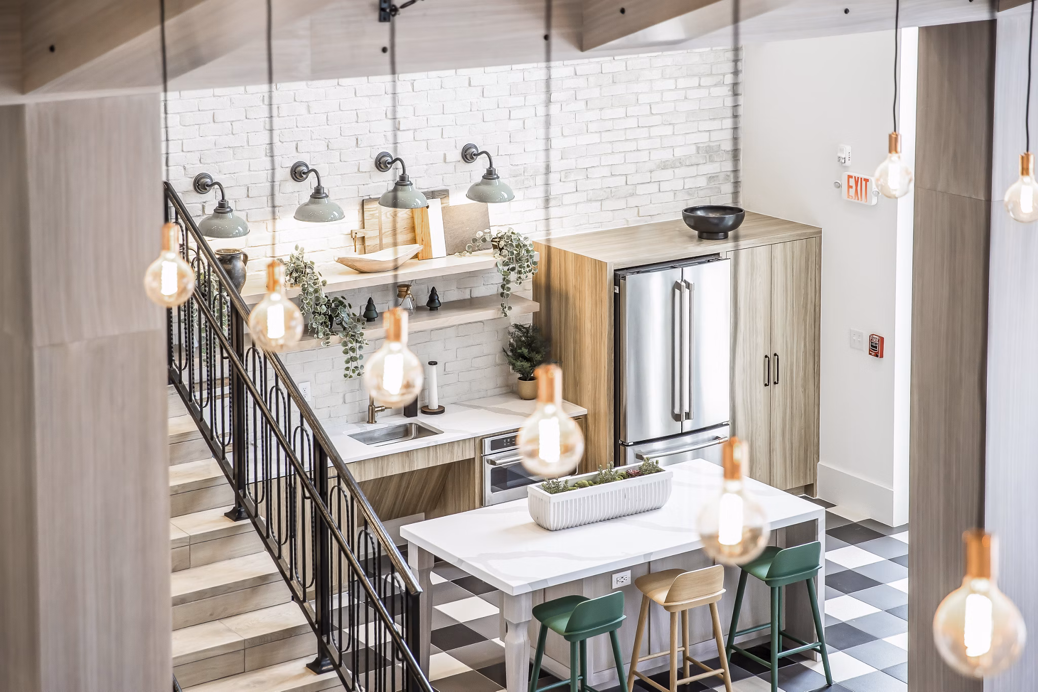 Clubhouse featuring modern amenities and stylish design at Alta Wren Apartments luxury complex
