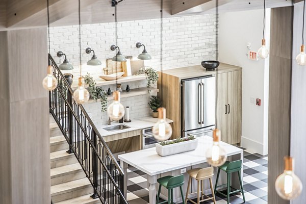 Clubhouse featuring modern amenities and stylish design at Alta Wren Apartments luxury complex