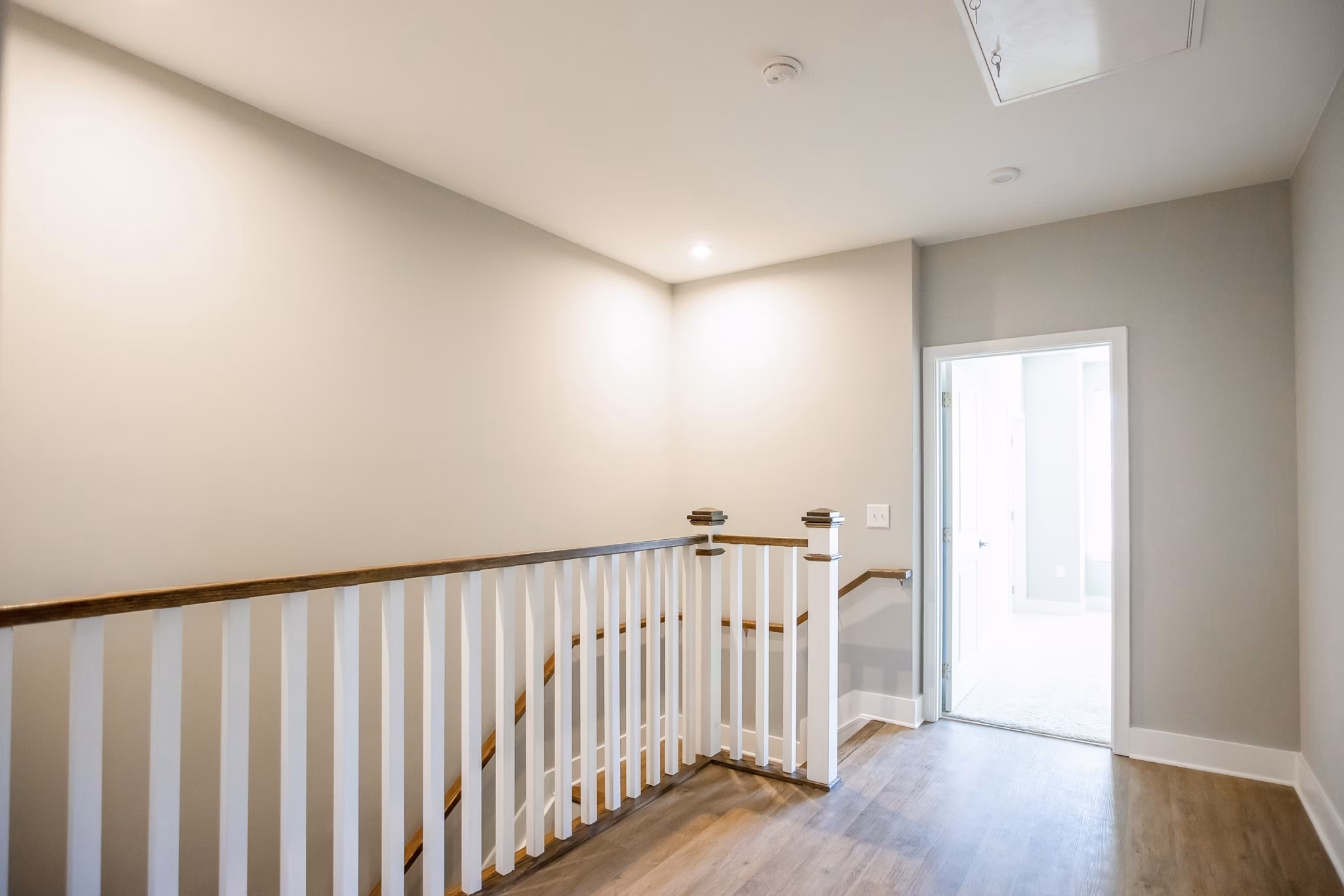 Stylish living room with modern furnishings and natural light at Alta Wren Apartments
