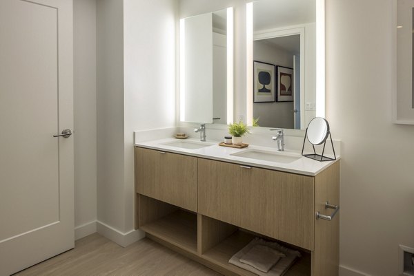 Luxurious bathroom with sleek fixtures and marble accents at The Brady Apartments