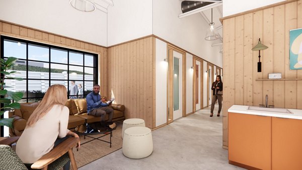Clubhouse featuring modern seating and entertainment options at The Station by Alta Apartments