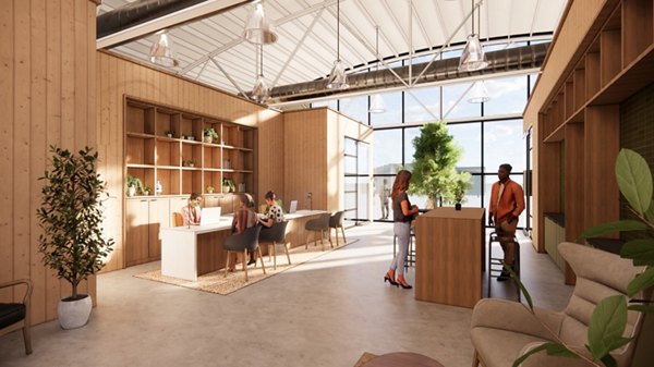 Clubhouse designed for relaxation and socializing at The Station by Alta Apartments, featuring stylish seating and modern decor