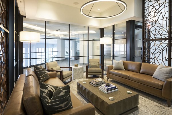 Clubhouse featuring luxurious seating and entertainment spaces at Elden Galleria Apartments
