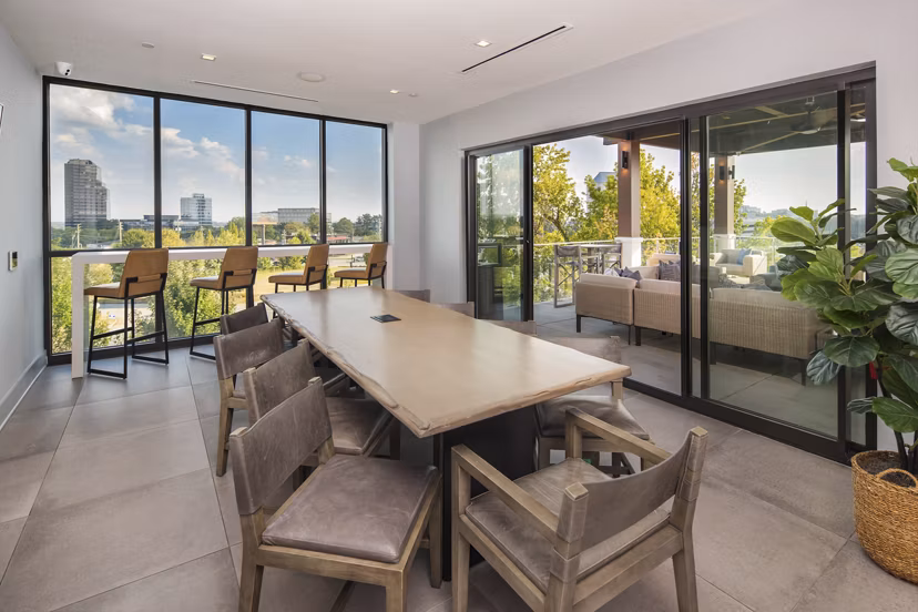Elden Galleria Apartments: Modern clubhouse featuring chic interiors and cozy seating areas
