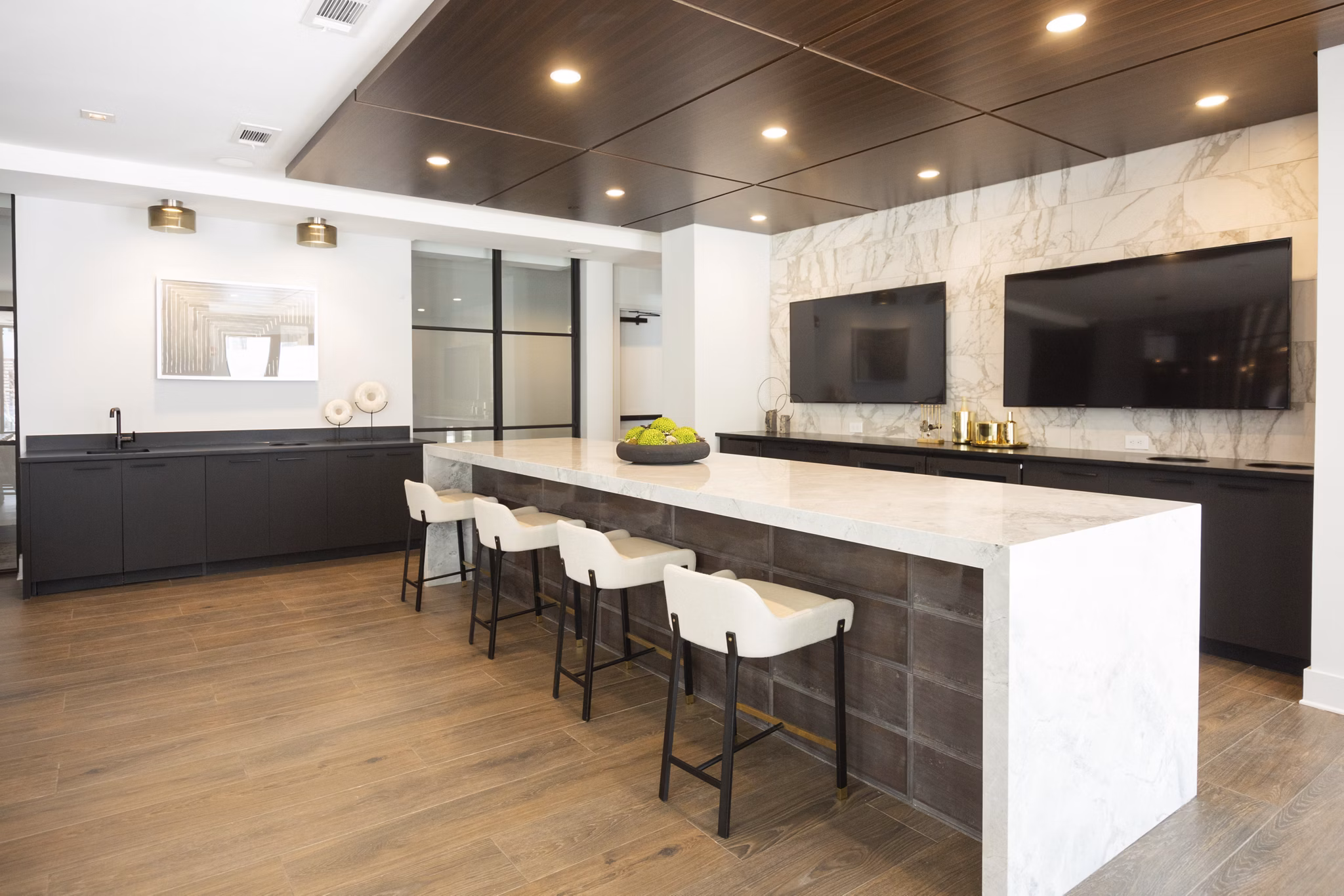 Elden Galleria Apartments: Modern clubhouse featuring open seating and contemporary design