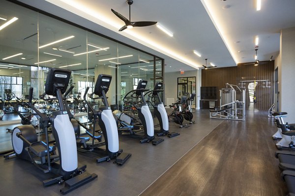 Modern fitness centre with state-of-the-art equipment at Elden Galleria Apartments in convenient urban location