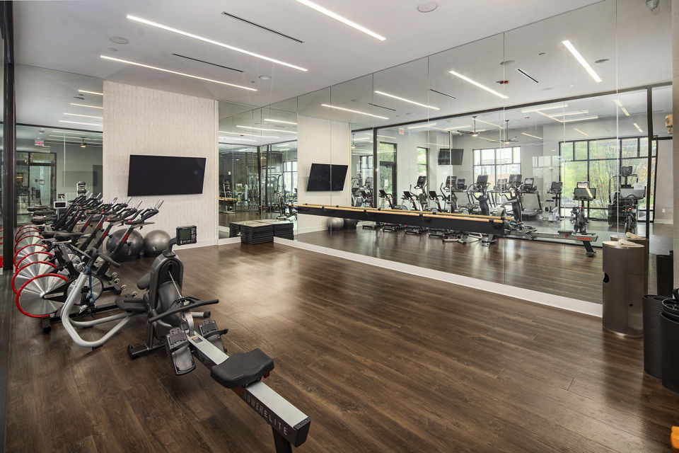 Modern fitness centre with state-of-the-art equipment at Elden Galleria Apartments in convenient urban location