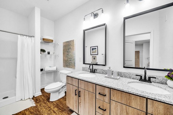 Modern bathroom with sleek fixtures in Fox Hunt Farms Apartments