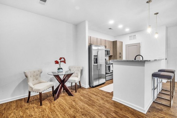 Elegant dining room with modern furnishings at Fox Hunt Farms Apartments