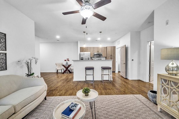 Spacious living room featuring modern furnishings at Fox Hunt Farms Apartments