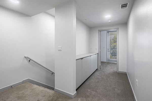 bedroom/hallway at Jefferson Cenza Apartments