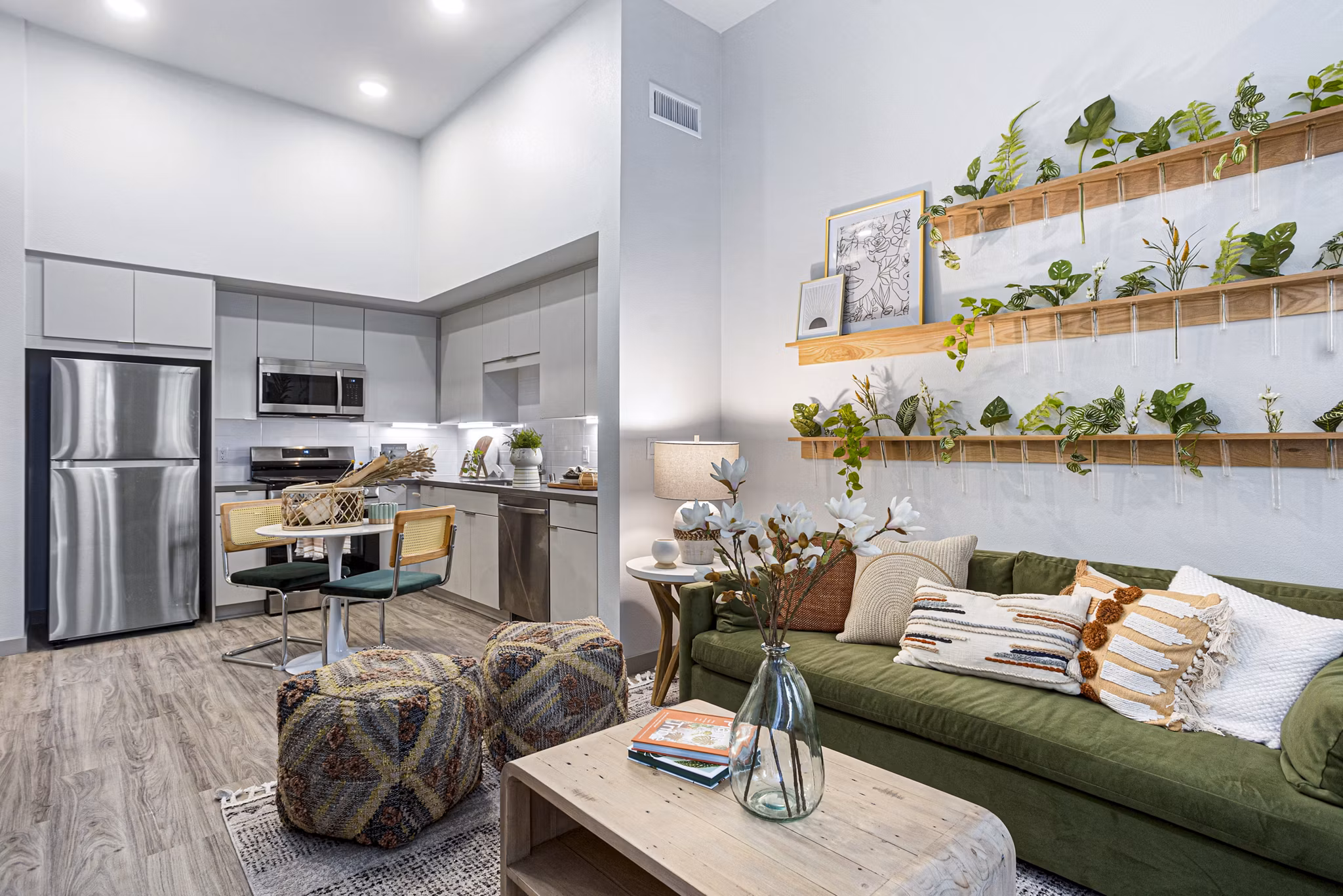 Modern living room with sleek furniture and open layout at Jefferson Cenza Apartments