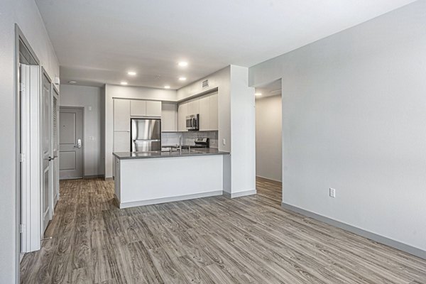 Spacious living room with modern decor in Jefferson Cenza Apartments offers luxury living experience