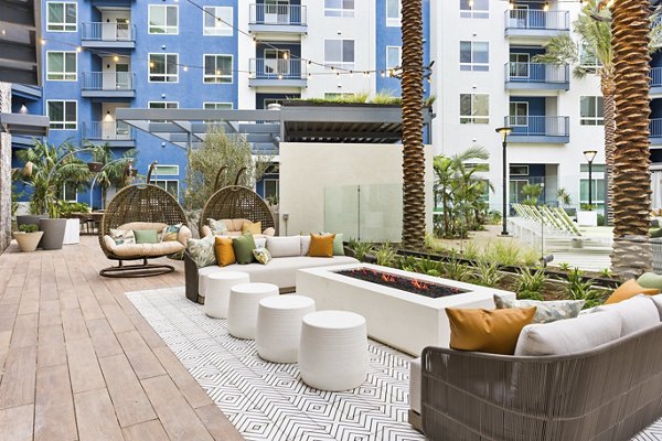 fire pit/patio at Jefferson Cenza Apartments