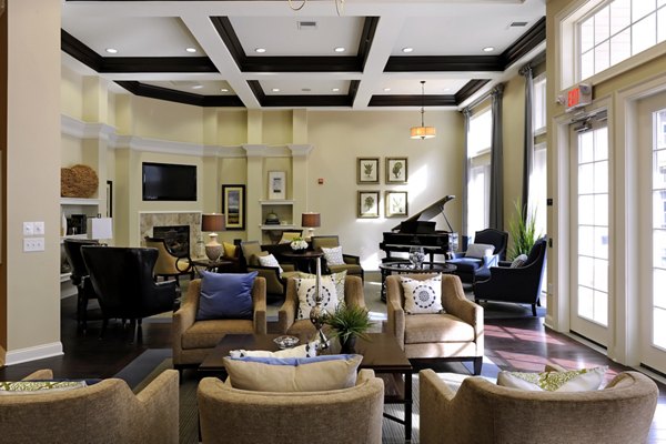 Chic clubhouse with modern decor at Kaiser Park Apartments, offering a luxurious communal space for residents to relax and socialize