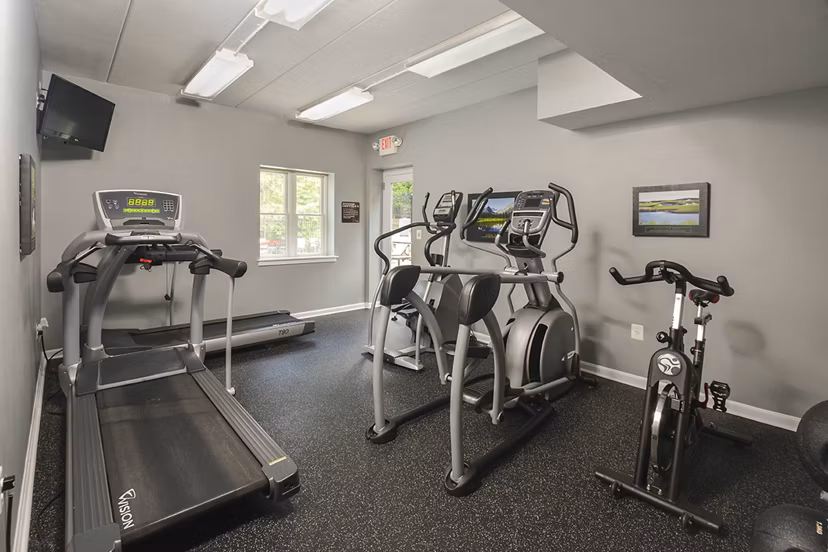 Fully-equipped fitness center with state-of-the-art machines at Kaiser Park Apartments