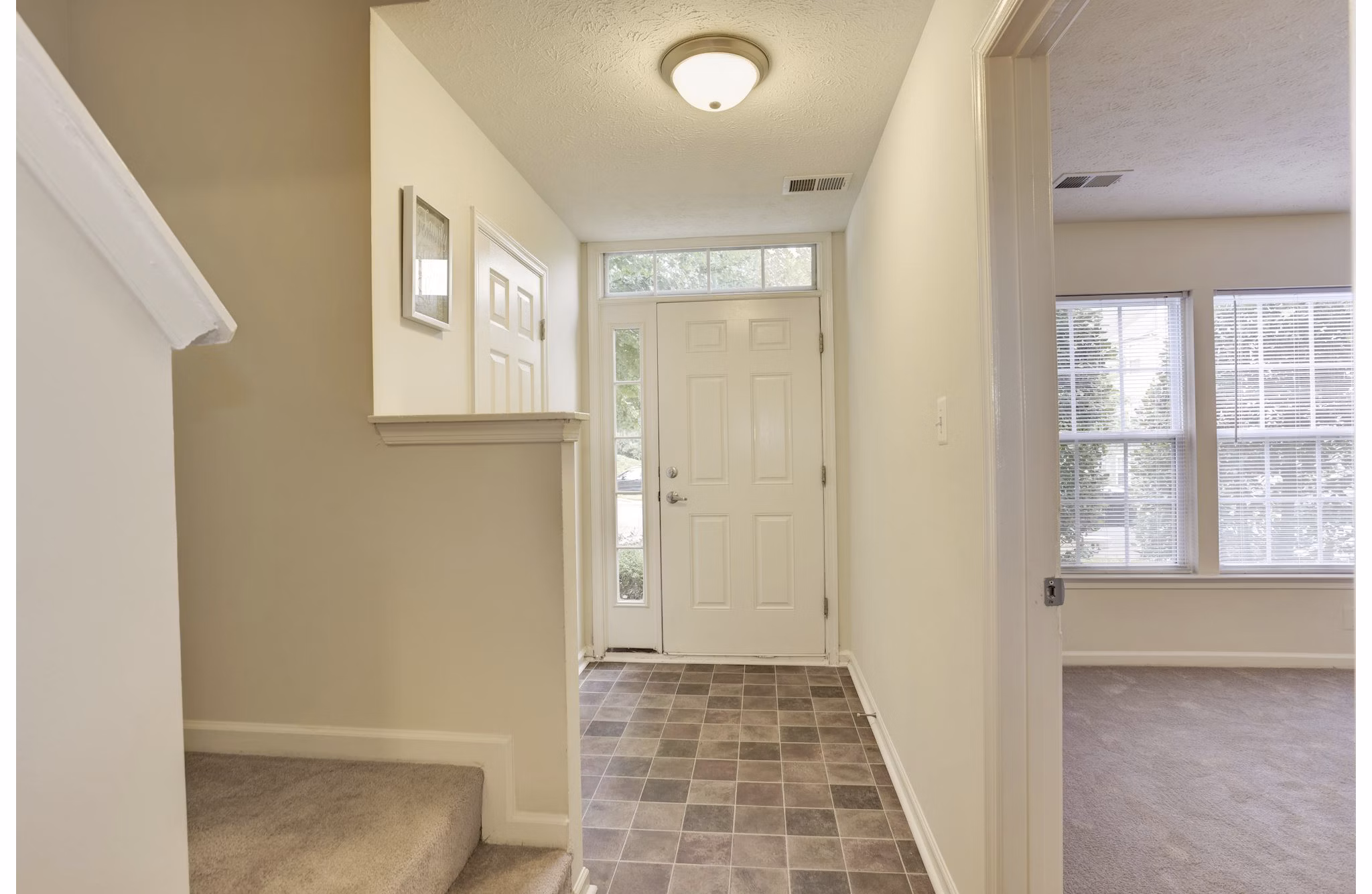 Spacious interior featuring modern kitchen and dining area in Kaiser Park Apartments luxury living
