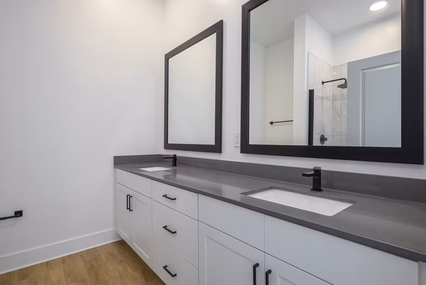 Modern bathroom featuring sleek fixtures and elegant design at Novel Nona Apartments