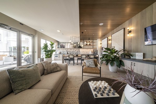 Clubhouse featuring modern design elements at Novel Nona Apartments, a luxury community offering upscale amenities and gathering spaces