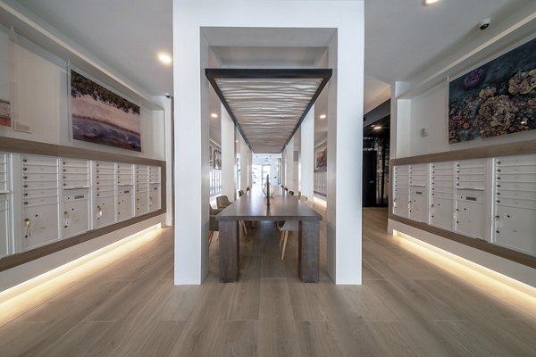 Modern clubhouse with comfortable seating and stylish decor at Novel Nona Apartments