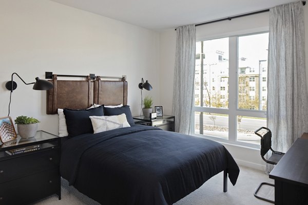 Lantana at Milpitas Station: Cozy bedroom with modern decor in luxury apartment community