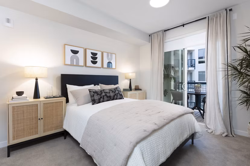 Lantana at Milpitas Station: Modern bedroom with stylish decor and natural lighting in luxury apartments