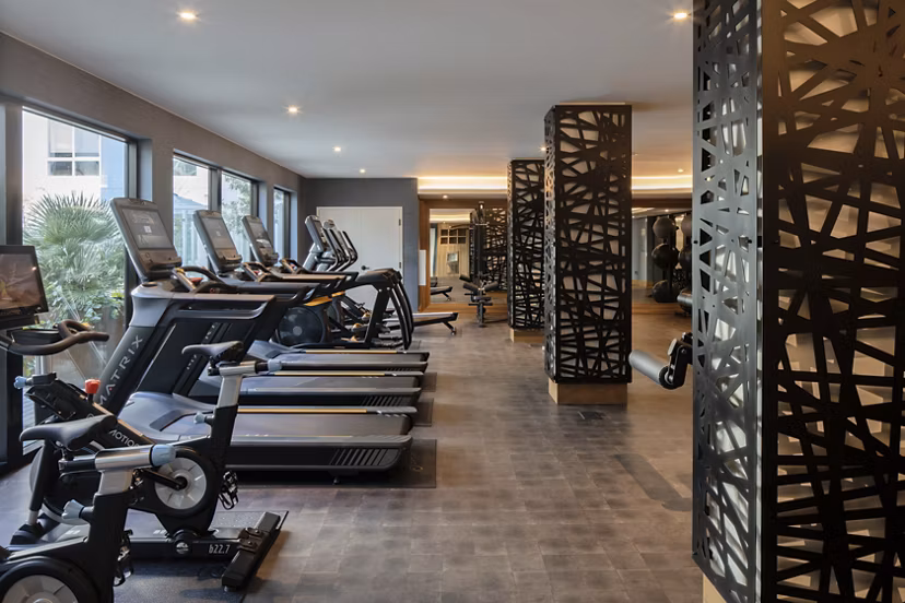 Fitness center with modern equipment at Lantana at Milpitas Station Apartments