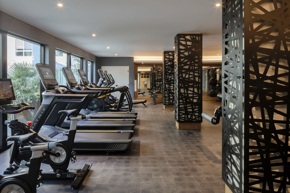 Fitness center with modern equipment at Lantana at Milpitas Station Apartments