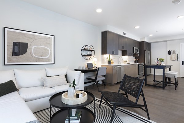 Spacious living room with modern decor in Lantana at Milpitas Station apartment, highlighting comfort and style for luxury living experiences