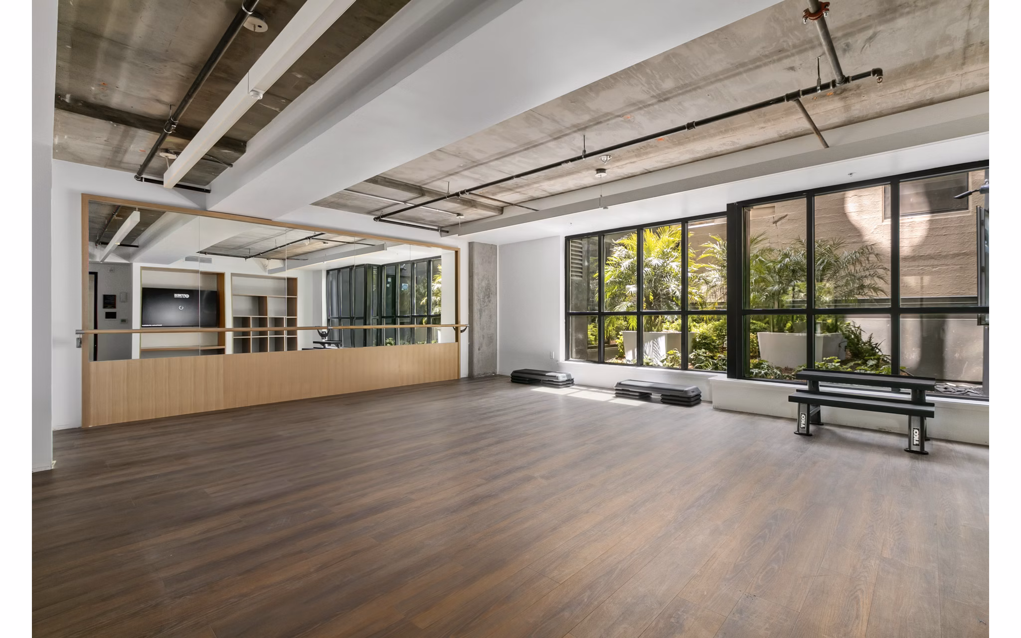 Fitness center with modern gym equipment at Lantana Uptown luxury apartments