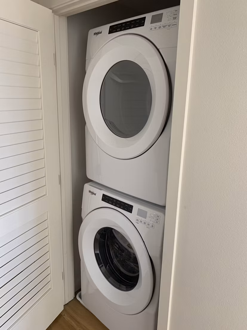Laundry room featuring state-of-the-art washers and dryers in Lantana Uptown luxury apartments