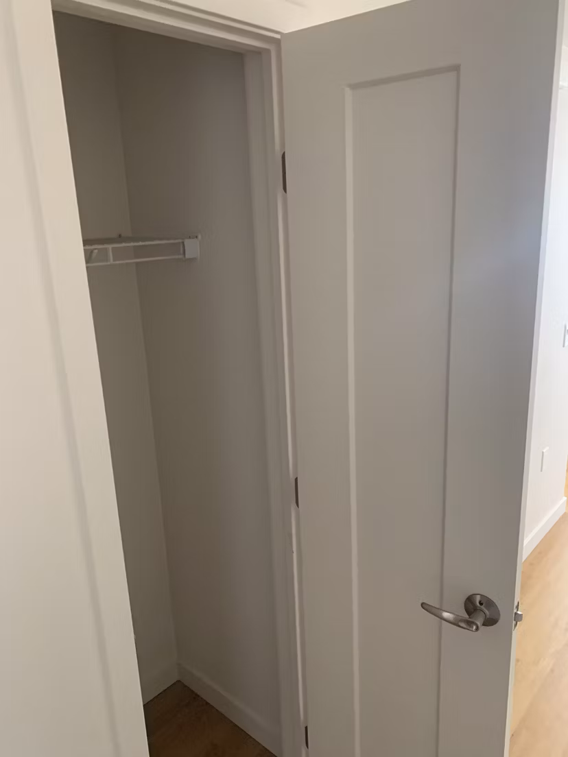 Laundry room with modern appliances at Lantana Uptown apartments in a vibrant urban setting