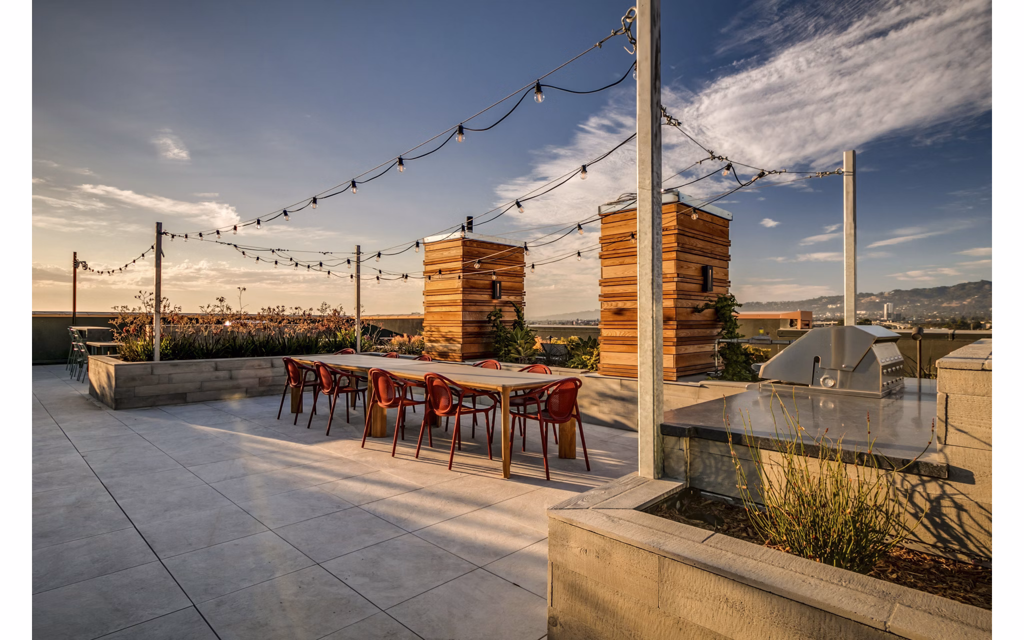 Lantana Uptown: Modern patio with stylish seating and lush greenery, luxury apartments in vibrant neighborhood