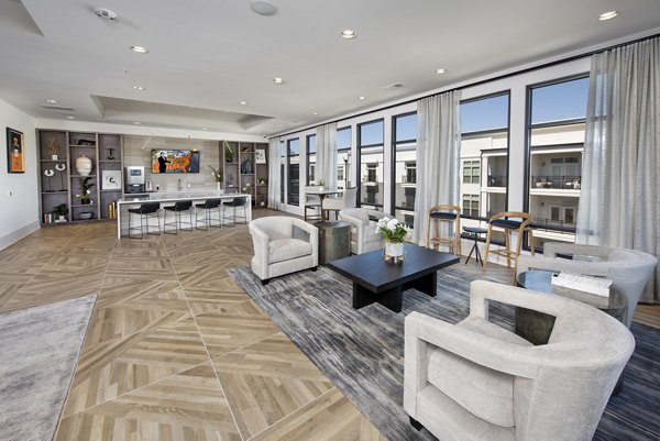 Clubhouse with contemporary design at The Lights at Northwinds Apartments, luxury property managed by Greystar