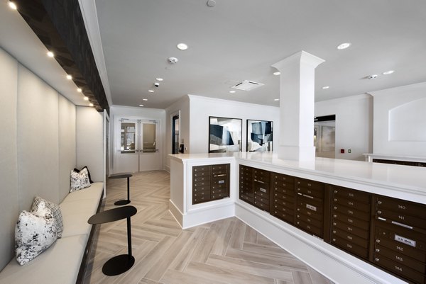 Contemporary clubhouse with cozy lounge and entertainment areas at The Lights at Northwinds Apartments