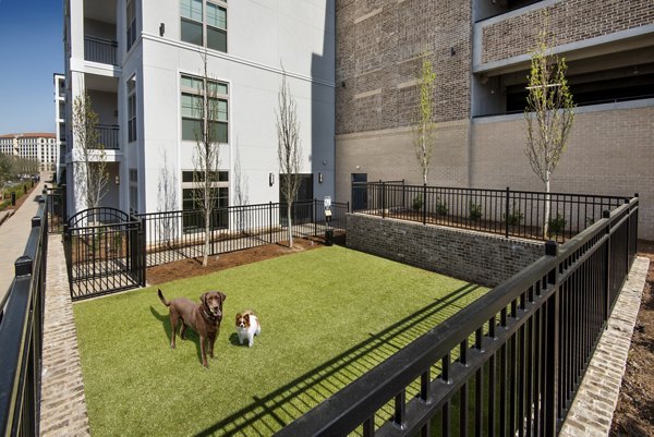 Recreation area with lounge seating and games at The Lights at Northwinds Apartments