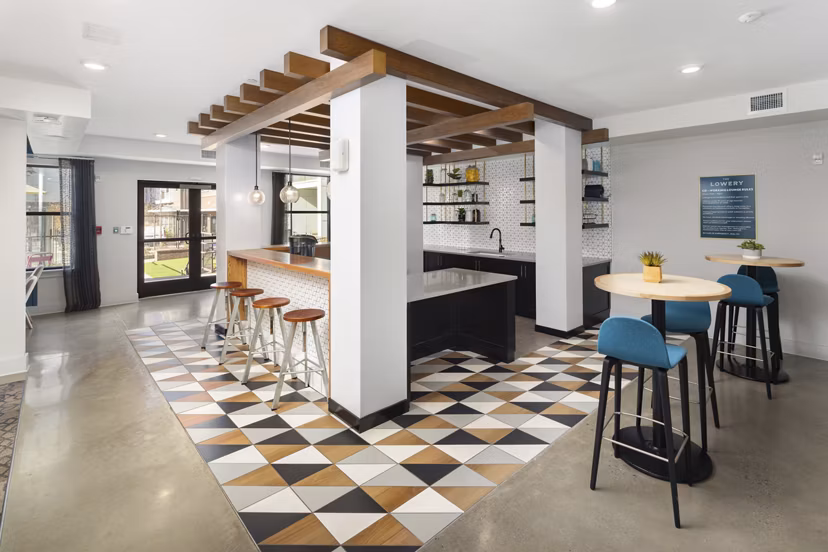 Clubhouse featuring modern design and comfortable seating at The Lowery Apartments
