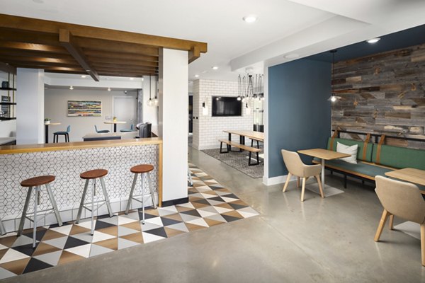 Clubhouse featuring modern design and cozy seating at The Lowery Apartments