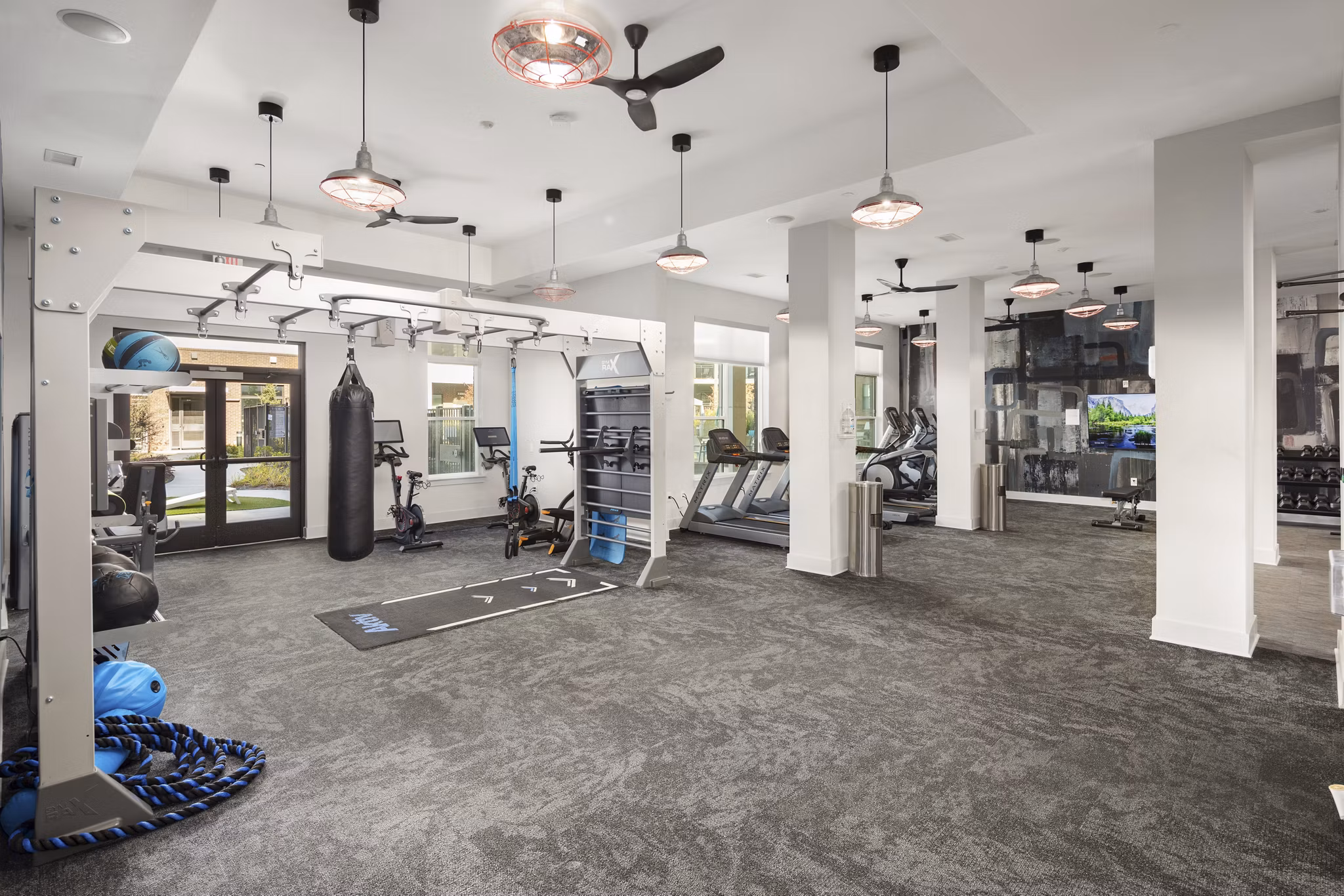 Modern fitness center with top-tier equipment at The Lowery Apartments