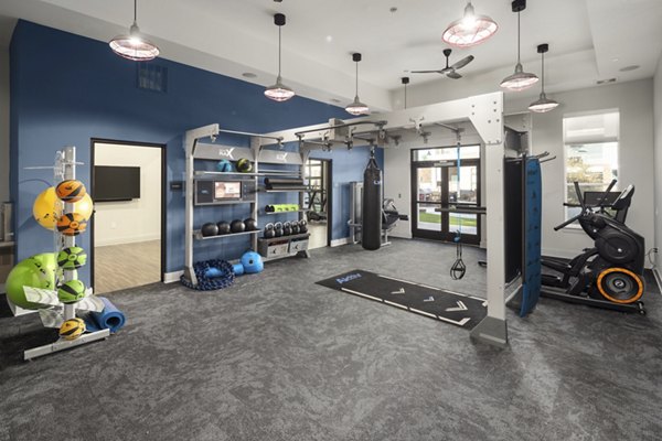 State-of-the-art fitness center with modern equipment at The Lowery Apartments