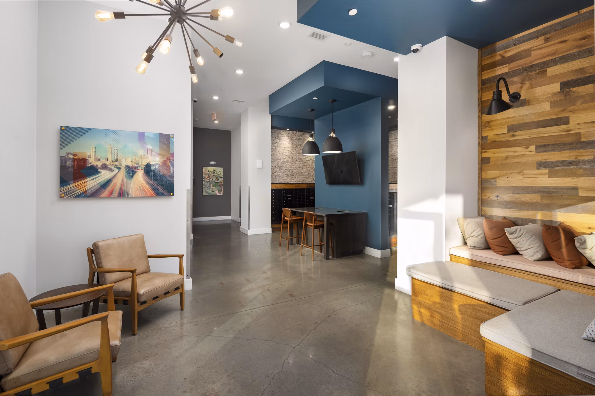 Well-equipped fitness center at The Lowery Apartments featuring modern exercise machines and spacious training areas for residents