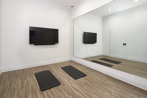 Relaxing lounge area with modern seating in The Lowery Apartments' recreation space