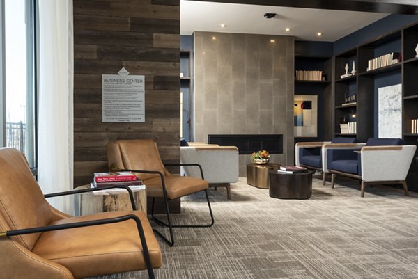 Stylish clubhouse with modern decor at Luxe at Mile High luxury apartments in Denver, perfect for social gatherings and events