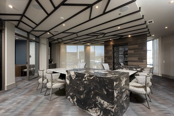 Luxe at Mile High: Elegant clubhouse featuring modern design and seating areas for residents in Denver