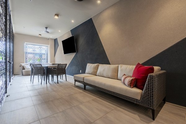 Elegant dining area with modern furnishings at Luxe at Mile High luxury apartments